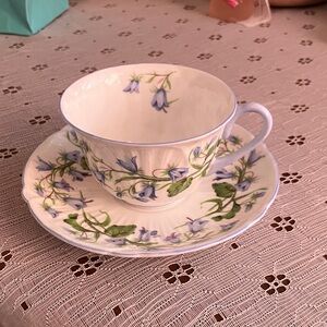 Elegant Floral Teacup and Saucer Set - White and Green